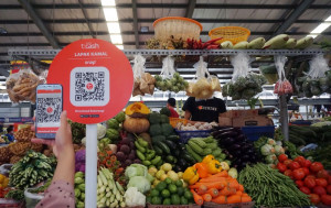 Fitur SNAP QR Code TCASH di pasar modern / TCASH