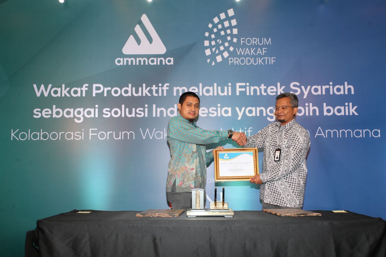 (ki-ka) CEO Ammana Fintek Syariah Lutfi Adhiansyah dan Pemimpin Divisi Dana dan Transaksional BNI Syariah Bambang Sutrisno / BNI Syariah