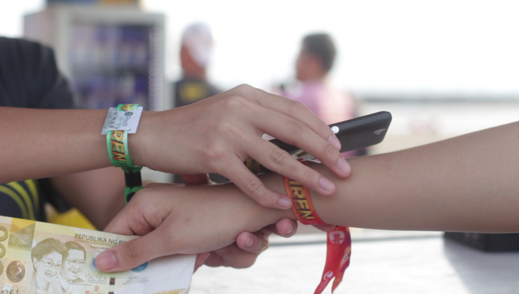 One of the leading product of PouchNATION, an NFC-based bracelet for access and payment at events / PouchNATION