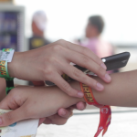 One of the leading product of PouchNATION, an NFC-based bracelet for access and payment at events / PouchNATION